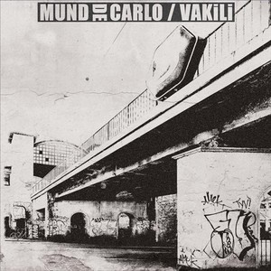 Vakili/Mund De Carlo