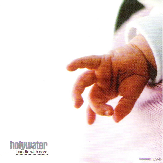 Handle With Care cover