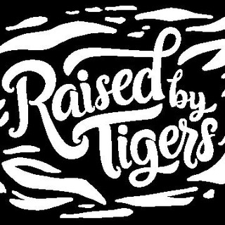 Raised by Tigers Photo