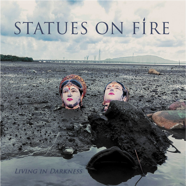 Statues On Fire Photo