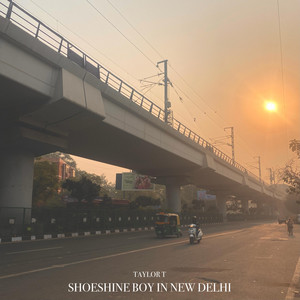 Shoeshine Boy In New Delhi by Taylor T