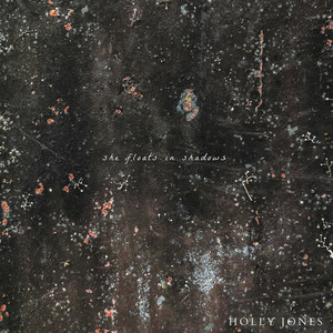 she floats in shadows by Holly Jones