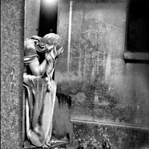 He Visits Her Grave by John X Belmonte