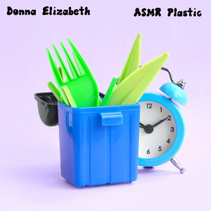 Playing with Plastic Beads in a Cup by Donna Elizabeth