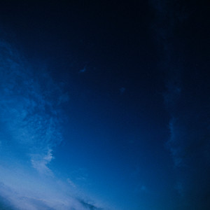 a dark blue sky by swiftly