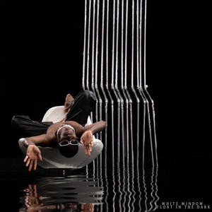 Float in the Dark by White Window