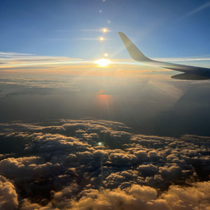 round brown planet by relaxing air plane