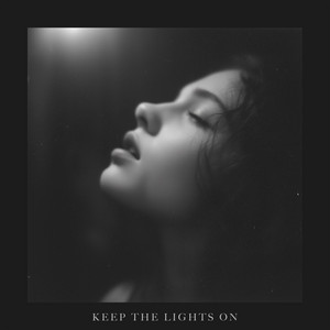 With the Lights On by Reign Luther