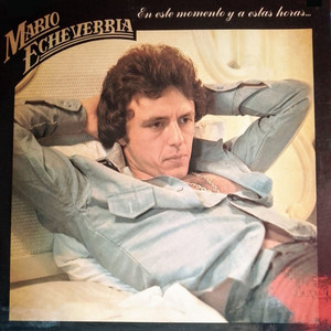En Este Momento Y A Estas Horas by Mario Echeverria