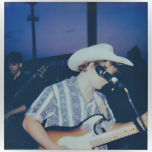 two guitars by surf cowboy