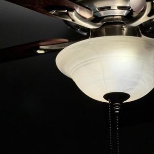head in the ceiling fan by Juxtaposer