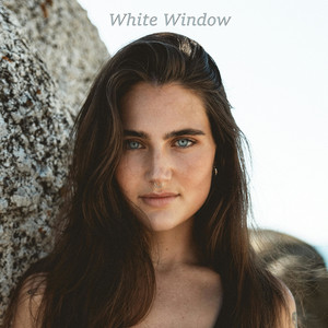 brown hair and blue eyes by White Window