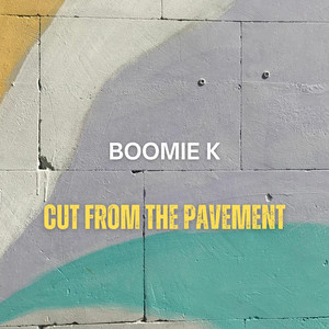 Cut from the pavement by Boomie K