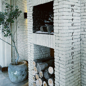 white fireplace by Loop Moon