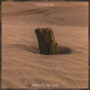 Fingers in the sand by Yolanda Rae
