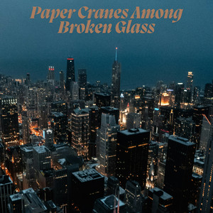 Paper Cranes Among Broken Glass