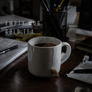 Cold Tea by Empty Mug