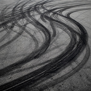 Burnt Rubber by V. Drenn