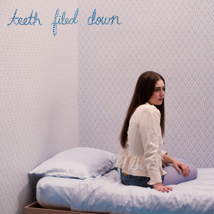 teeth filed down by Nathalie Miller