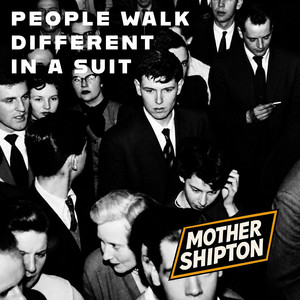 People walk different in a suit