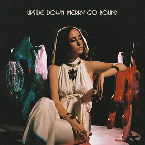 Upside Down Merry Go Round by STACEY