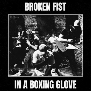 broken fist in a boxing glove by tenmonthsummer