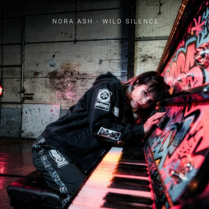 When the world goes quiet by Nora Ash