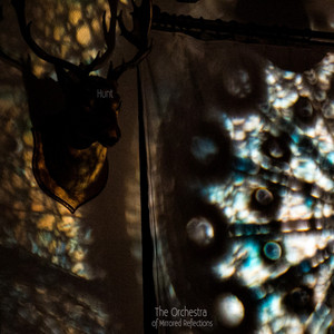 The Orchestra of Mirrored Reflections — Hunt