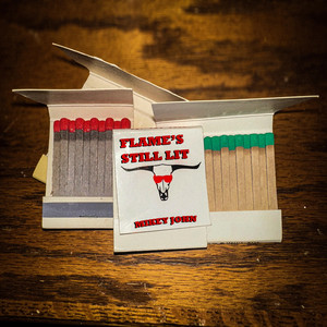 Flame's Still Lit by Mikey John