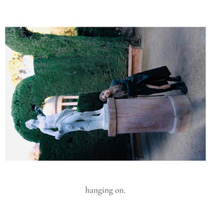 Обкладинка: hanging on.