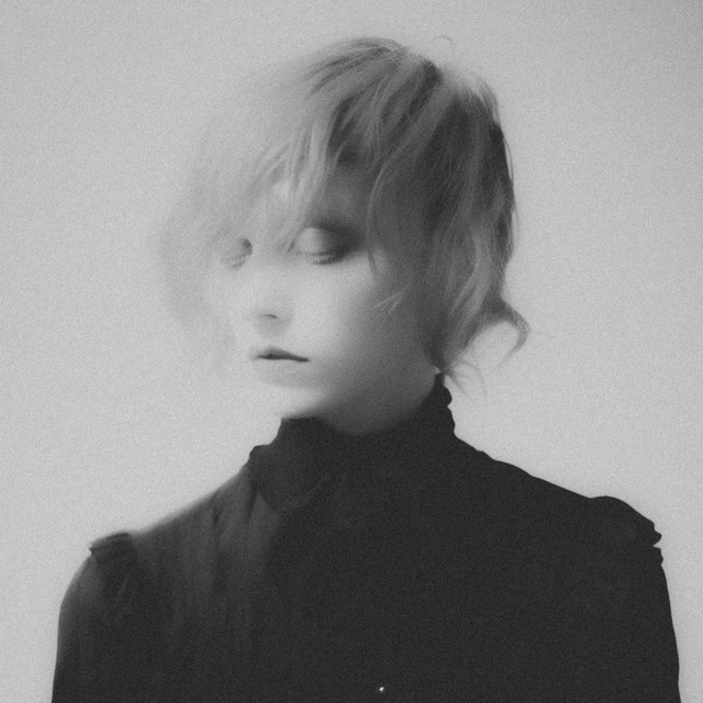 find a black dog and remove it's heart cover art