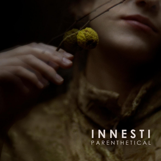 Parenthetical cover art
