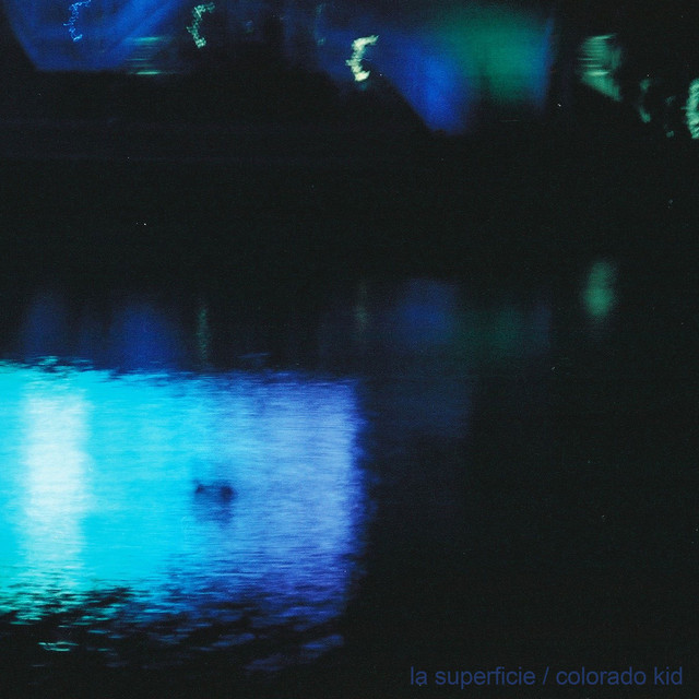 la superficie cover art