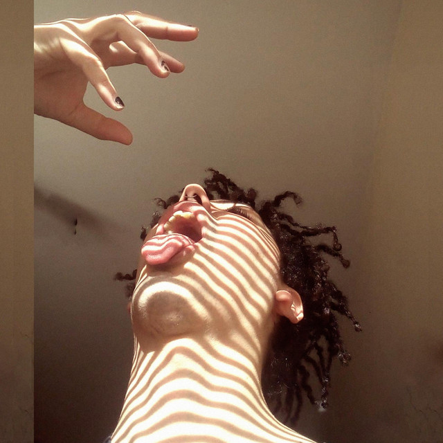 Between Giant $houlders cover art
