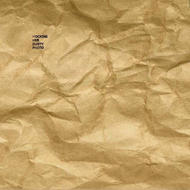 Обкладинка: Her Dusty Photo — Hockins