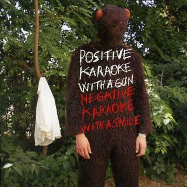 Positive Karaoke with a Gun Negative Karaoke with a Smile cover art