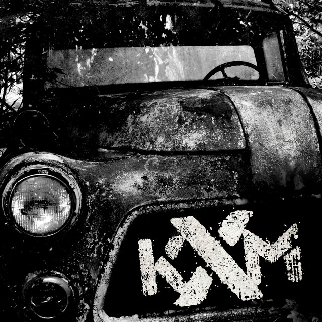 KXM cover art