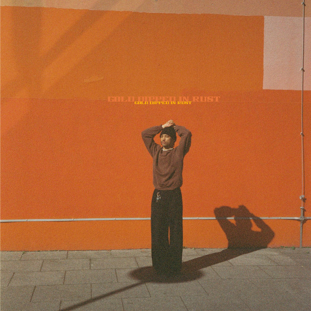 Gold Dipped In Rust cover art