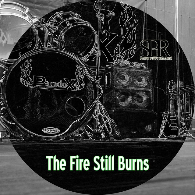 The Fire Still Burns cover art