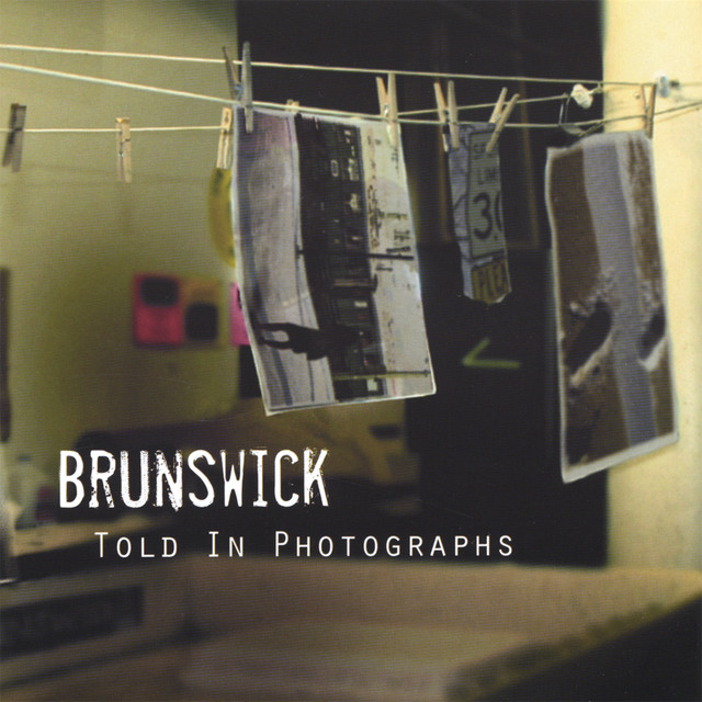Told In Photographs cover art