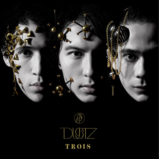 TROIS cover art