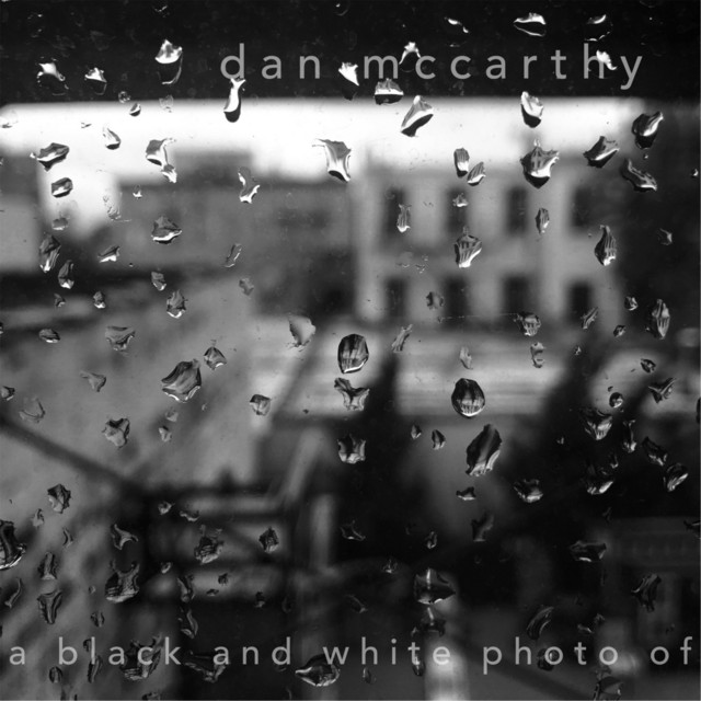 A Black and White Photo Of cover art