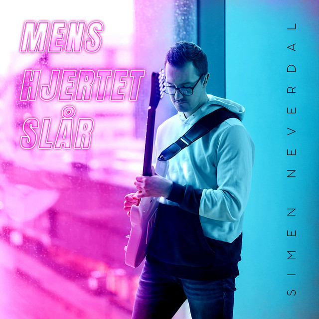 Mens hjertet slår cover art