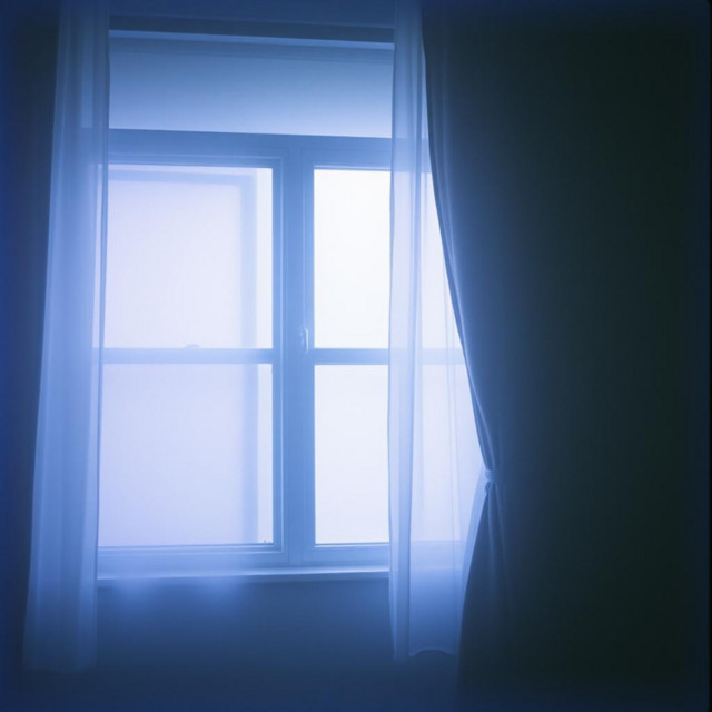 Ghost at the window cover art