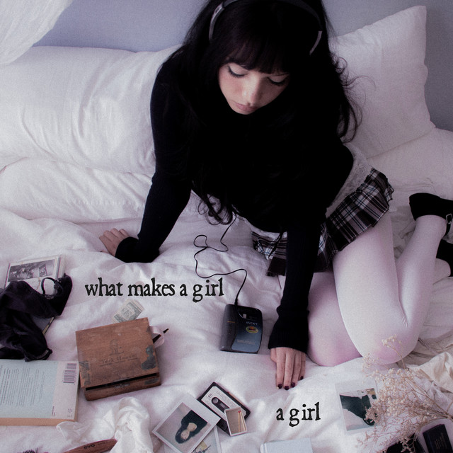 What Makes A Girl A Girl album image