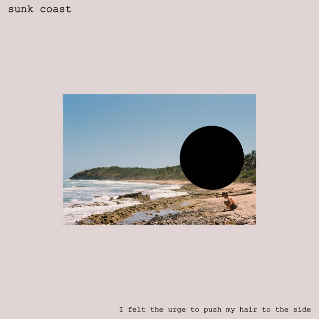 I felt the urge to push my hair to the side album image