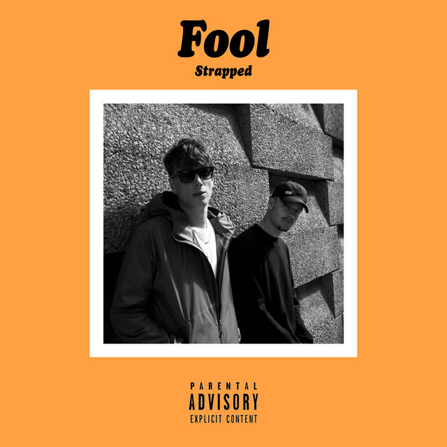Strapped cover art