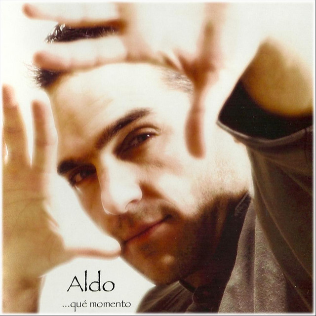 Que momento cover art