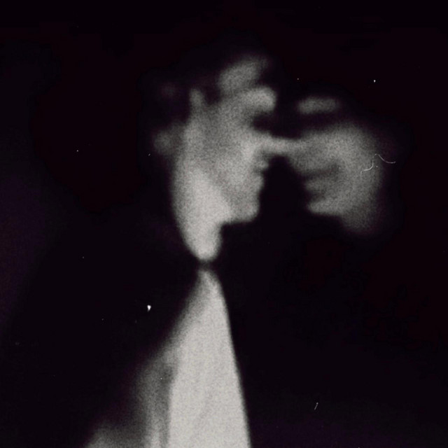 Ghosts Between Us cover art
