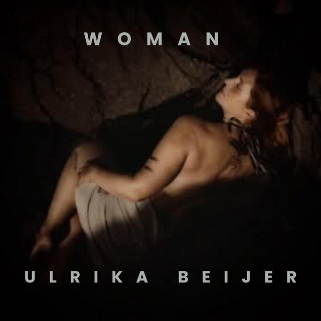 WOMAN cover